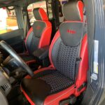 black captain chairs with red accent