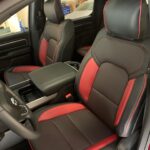 black seats with red accents