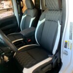 black seats with white accents